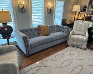 Beautiful Couch in excellent condition. Side chairs are like new. Light sconces, blinds, built-in shelving all for sale. 