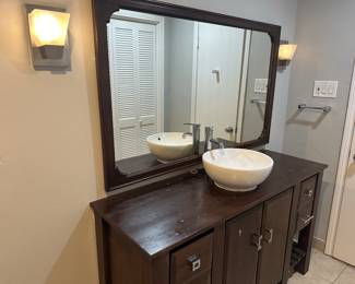 Vanity, bowl sink, faucet, mirror, sconces, the bathtub and the plumbing fixtures and toilet are also available. 