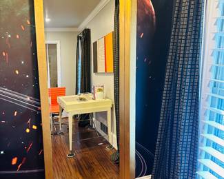 Full length mirror, custom curtains and plantation shutters. 