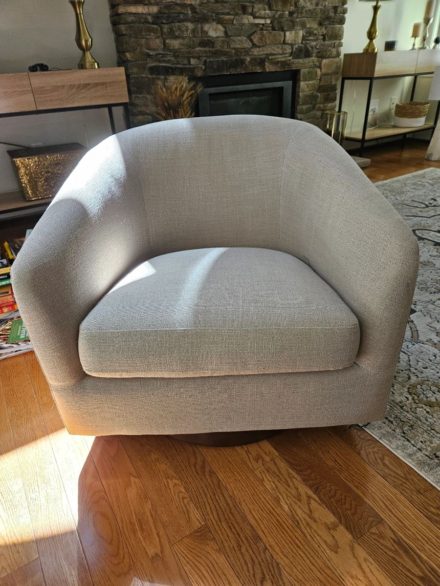 Beige swivel accent chair 