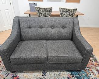 Gray cloth loveseat 