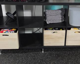 Black cube organizer with metal legs 
