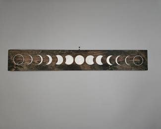 Moon phases on wood artwork