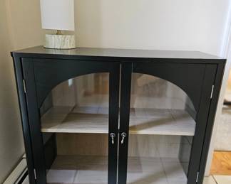 Black accent cabinet with glass doors 