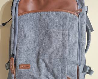 Gray backpack with brown leather trim 
