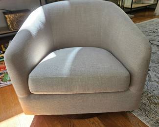Beige swivel accent chair 