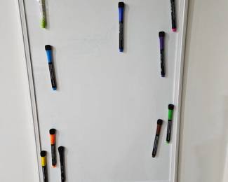 Whiteboard with magnetic markers 