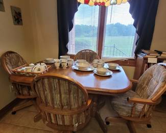 Oak dining table and chairs