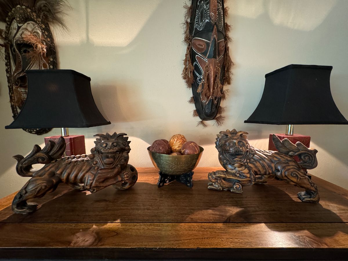 carved wood foo dogs.