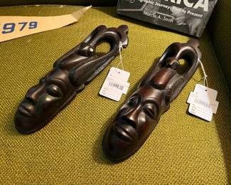 African tribal carved wood (A), African tribal carved wood (B)