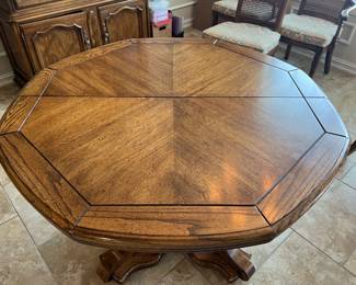 Dining Table with SIX chairs (five side and one armchair) with TWO Leaves and a set of Pads $250.00