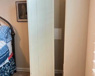 Corner Cabinet measuring 26" wide, 14" deep, and 65.5" tall $75.00