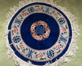 Round Chinese art deco rug.