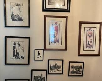 Assorted framed prints.