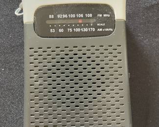 Radio Shack AM/FM pocket portable radio .