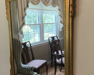 Gilded decorative mirror.