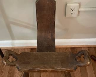 Antique primitive wood milking stool/birthing chair three-legged with back.