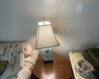 Floral sofa, end tables, lamps and small painted drop-eaf table.