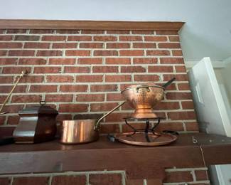 More copper items - copper colander, copper sauce pan.