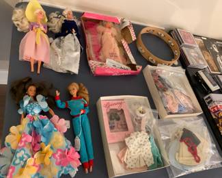 Vintage Barbies and clothing. Original marker signed Kenny Rogers tambourine.