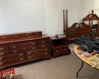 Complete bedroom dresser drawers with mirror, nightstand and bed frame set.