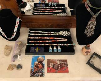 Native American beaded jewelry, arrowheads and Civil War bullets.