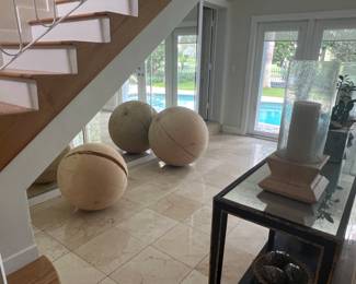 Large wood balls from art gallery.  Approximately 32" and 24"