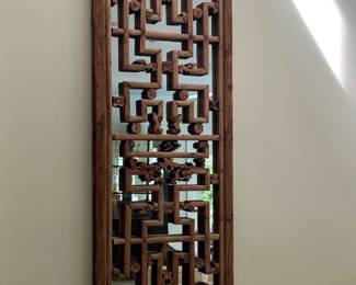 Asian wall panel on mirror