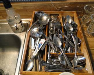 Because sometimes you just need to take pictures of messy silverware trays.