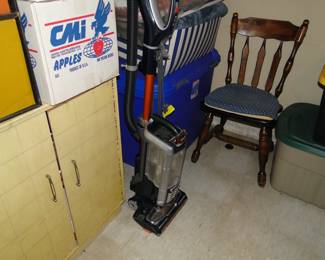 Vacuum and random chair in the corner