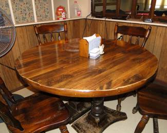 Solid wood table and chairs.