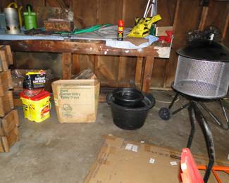 Firepit on  the right side of the picture, which does not appear to be used at this time