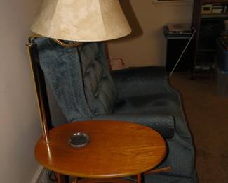 Magazine holder, table, and lamp.  A real multitasker! 