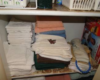Clean and neat folded towels.  Remember that silverware drawer picture, these are not as messy as that 