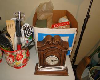 Ceramic clock and box of cooking supplies