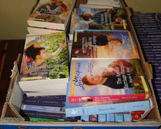 Ok, here goes, there is going to be many repeating phrases  at work here, but we cannot stress enough that when we say we have every romance novel ever written, we are not kidding, and we think that some of them have never been read either, but we have a lot, so again, please be brave while reading the next few pictures.