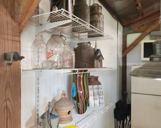 Assortment of milk jugs and cans, decor