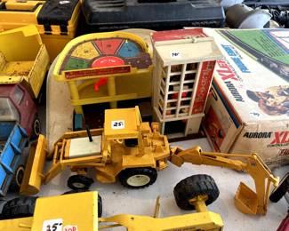 #121	Tonka Yellow Backhoe  - metal	 $25.00 
