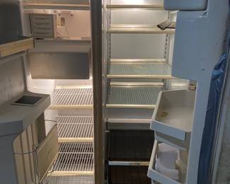 #141	Kenmore SXS almond color Frig 	 $75.00 			
