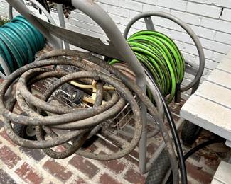 #100	Hose Reel w/green hose	 $50.00 
