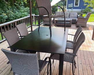Outdoor table with 6 chairs.