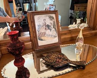 Vintage wooden book with print on to and mirror inside