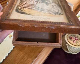 Vintage wooden book with print on to and mirror inside