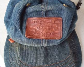 Original 70's orange tab strap back. Really hard to find folks.