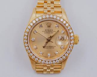 Ladies diamond Presidential Rolex in 18k gold