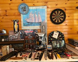 Large collection of knives including pocket knives, display knives.  Check out the Harley lamp!!