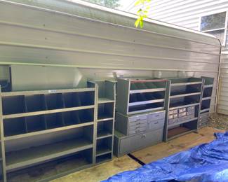 Metal shelving from a utility truck/van