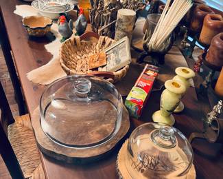 Cake plates, wooden decor, candles, vintage candleholders, Deer hide table cover.
