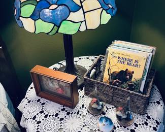 Lovely crocheted table cover, antique table, Tiffany style lamp, Little Golden Books.