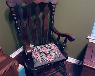 Vintage sturdy rocking chair and embroidered pillow.  Love.